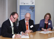 Truett Tate, Lloyds Group Executive Director, Prof Nick Lieven, Pro-Vice Chancellor of Bristol University, and Prof Rebecca Hughes, Pro-Vice Chancellor of Sheffield University, signing the contract to launch the Lloyds Scholars Programme at the bank's London headquarters