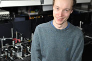 Research physicist Peter Shadbolt with the quantum optical chip.