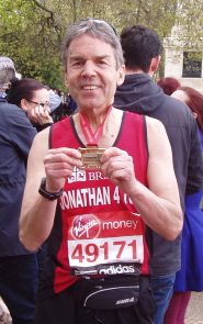 Dr Jonathan Nicholls with his London Marathon medal