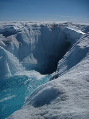 Moulins deliver surface meltwater through 1km of ice to the bed of the ice sheet