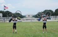 Marcus and Nick celebrating the end of their cycle challenge in Washington