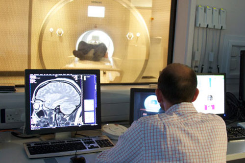 Image of a person being monitored in a CT scanner
