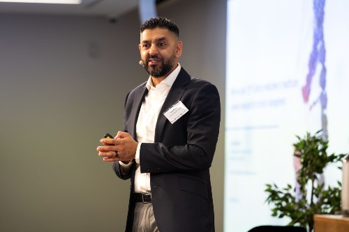 Tay Salimullah VP, Head US & Global Commercial, Value & Access, and Member of the Executive Committee at Novartis Gene Therapies, presenting one of the event's keynote talks.