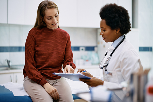 Generic image of a doctor with a patient [iStock]