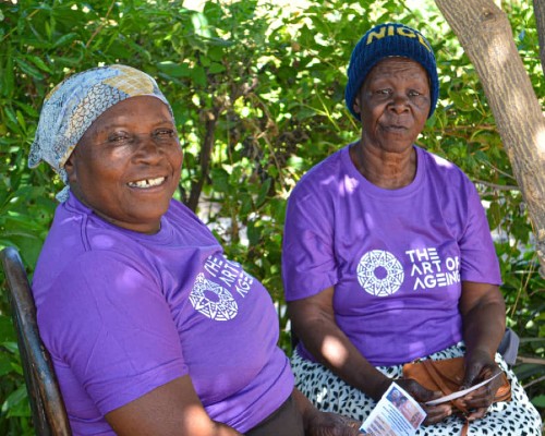 Image of two women taking part in an Art of Ageing competition in Harare, Zimbabwe. Credit Ardent Creative