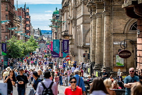 People walking down Buchanan Street in Glasgow
