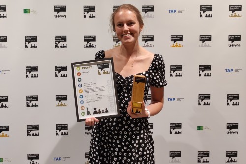 Lucy Westover with the Carbon Literacy Project accreditation award.