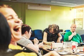 People with intellectual disabilities doing an art workshop