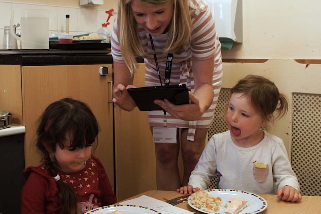 Preschoolers having lunch