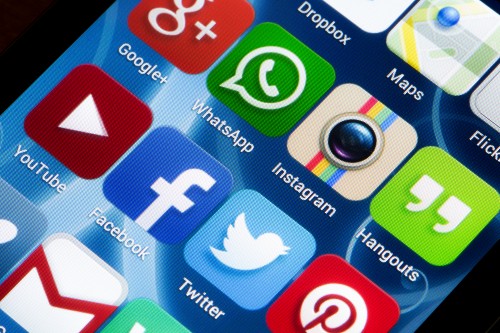 Generic image of an iphone screen with social media apps.