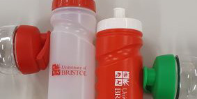 Image showing a variety of University of Bristol branded water bottles with different coloured drinking caps and clear or opaque plastic bottles