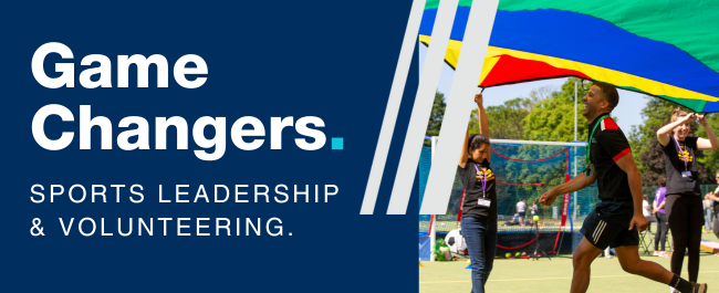 Game Changers - Sports Leadership and Volunteering. Image of two Game Changers and a member of Sport staff having fun leading an outdoor activity with a colourful tent.