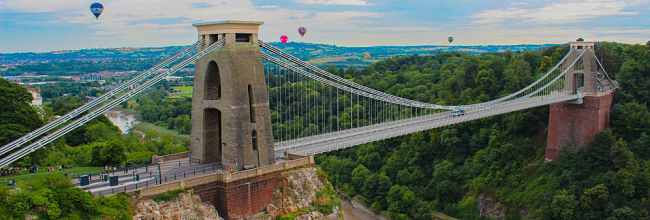 Clifton Suspension Bridge with hot air balloons in the background