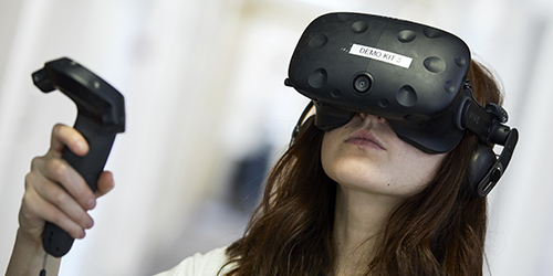 A student wearing a VR headset.