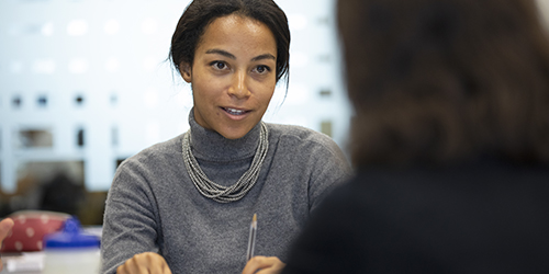 A student speaking to another student.